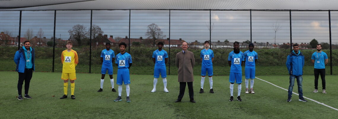 Jeremy West, Chairman and Managing Director of West and Coe Funeral Directors with the Future FC team 