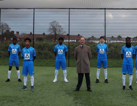 Jeremy West, Chairman and Managing Director of West and Coe Funeral Directors with the Future FC team